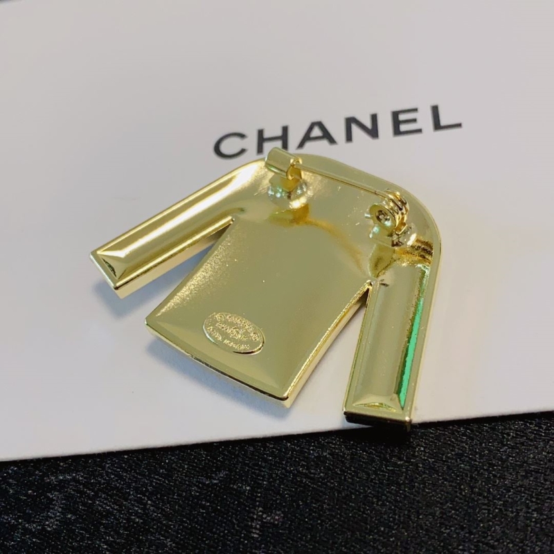 Ch**el brooches